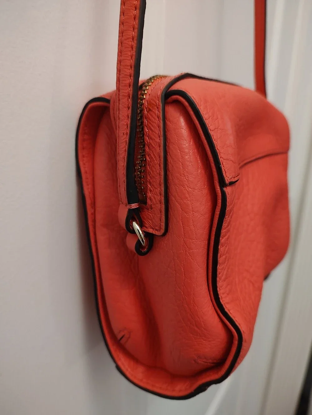 Kate Spade Coral Pink Leather Crossbody Bag with Floral Cutout